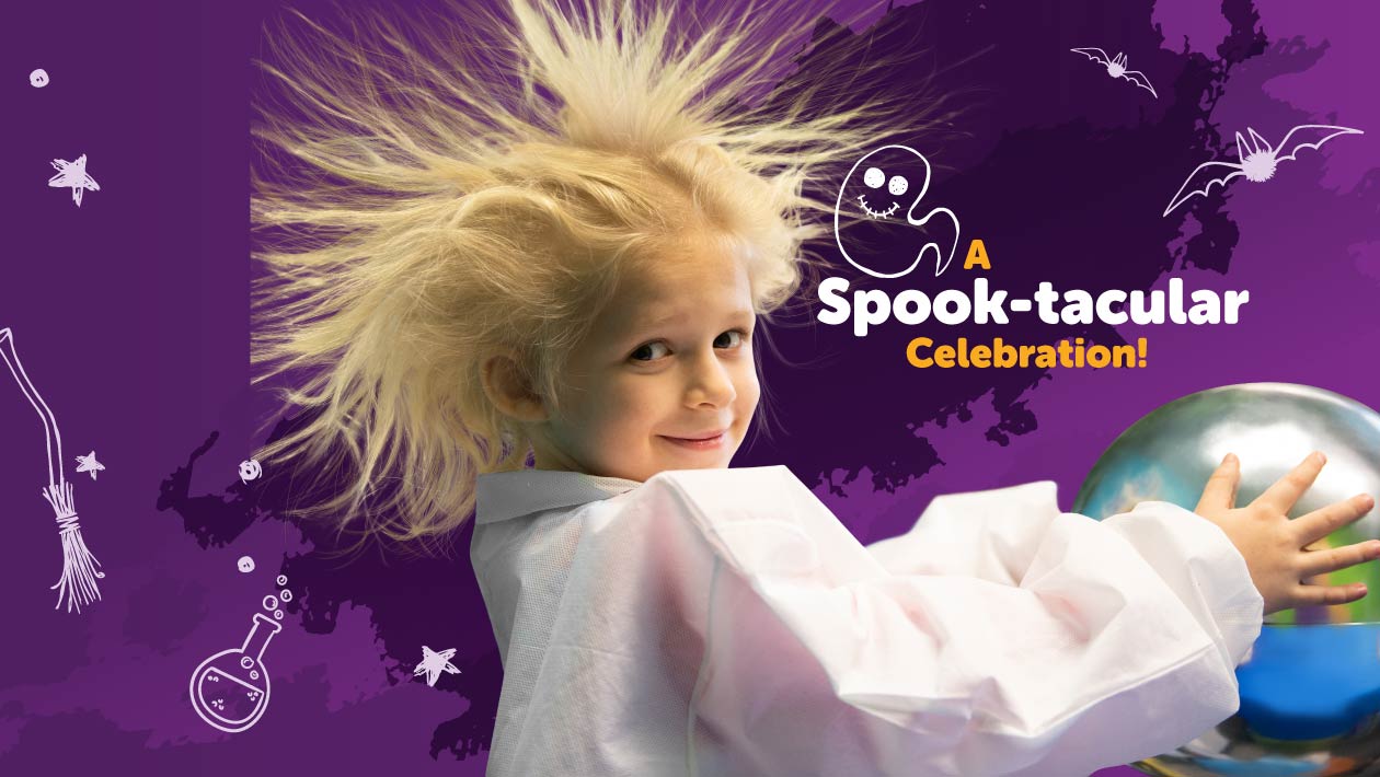 Girl using a Van de Graaff generator.